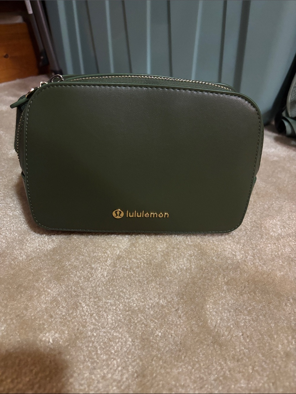 lululemon olive green crossbody with gold logo